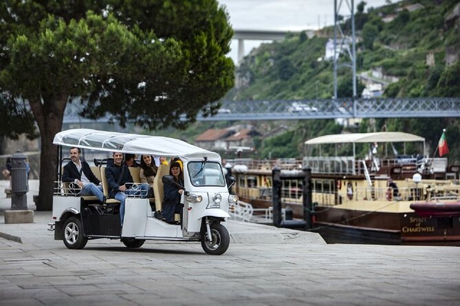 2 Hour Private Tuktuk Tour in Porto to Monastery and Cellars - Driving Past Dom Luís I Bridge and Torre dos Clérigos