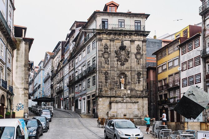 Authentic Oporto Walking Tour with Wine Tasting - Port wine tasting finale in a local cellar