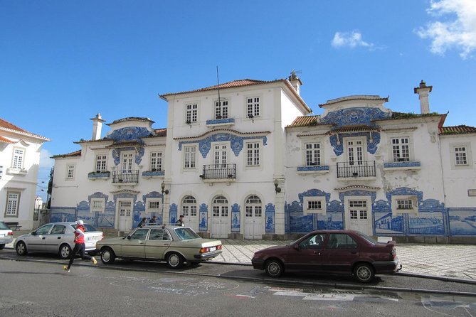 Aveiro & Costa Nova Private Tour – Canals & Striped Houses - Praia da Barra: busy beach vibes and water-sports energy