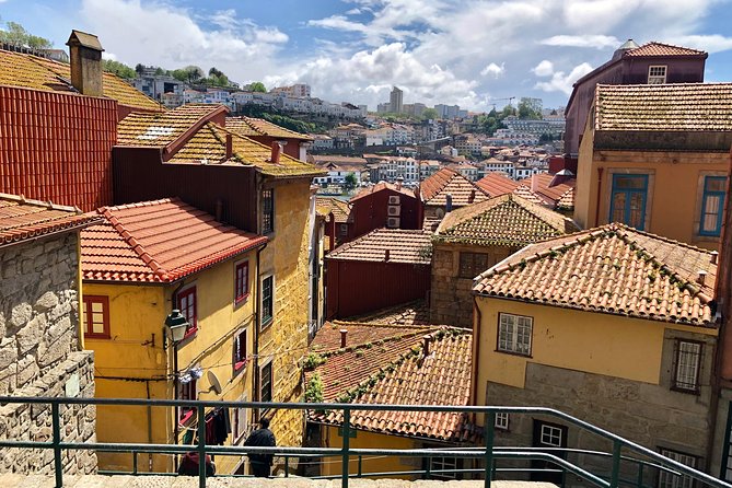 City Walking Tour & Port Wine Cellar - Through the oldest neighborhood: invasions, Portuguese Discoveries, and how stories overlap