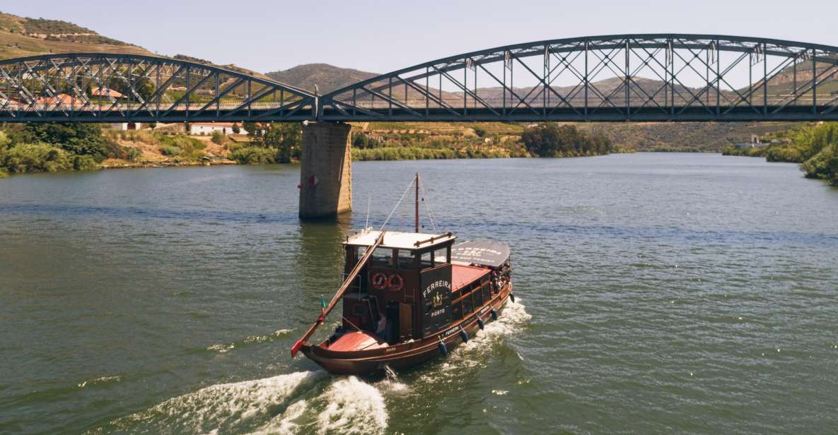 From Pinhão: Douro Valley Rabelo Boat Tour with Audio Guide - Quinta do Bomfim: the first terraced-vineyard “aha”
