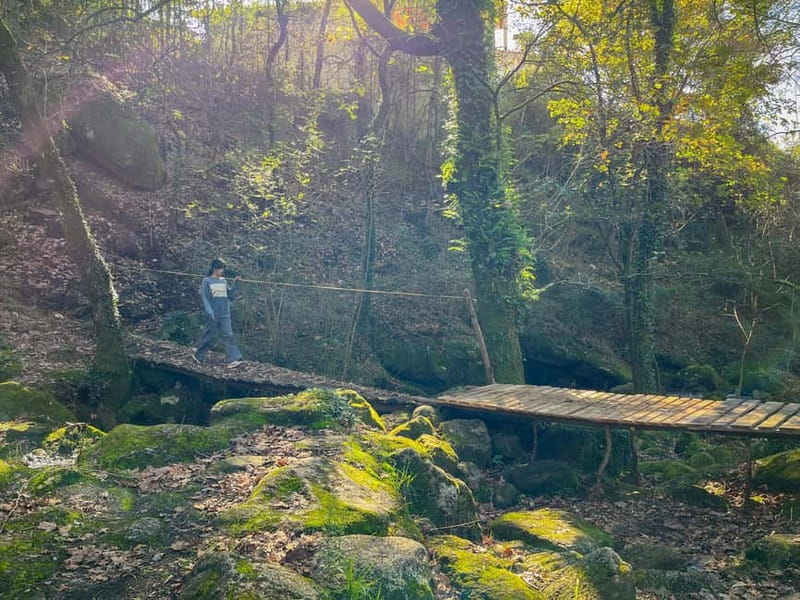 From Porto: Forest Waterfalls & Roman Ruins Trail Tour - The Village Passing Moments: A Quiet Taste of the Area