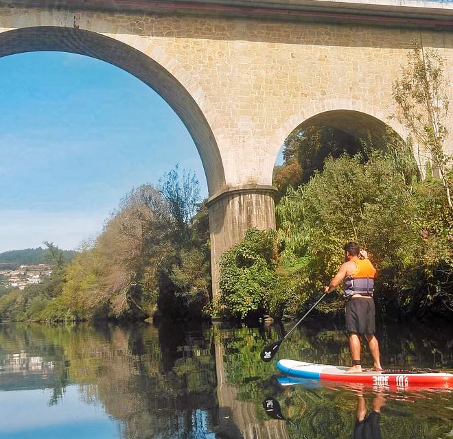 From Porto: SUP Paiva River Tour with Transfer - Breaks, swims, and how the guide keeps the day fun