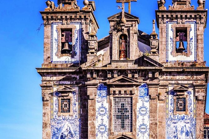 Half-day small group tour of Porto city with wine tasting - Clérigos Tower, Sé area, and the hill churches: what those stops are for