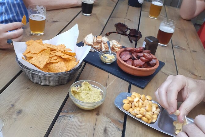 Porto: Craft Beer Tasting Tour with Local Snacks - Beer garden finale: 4 more production-line craft beers with snacks