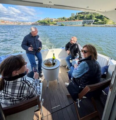 Porto: Douro River Cruise / Welcome Drink/with sunset option - Porto and Gaia landmarks from the water, including Dom Luis I Bridge