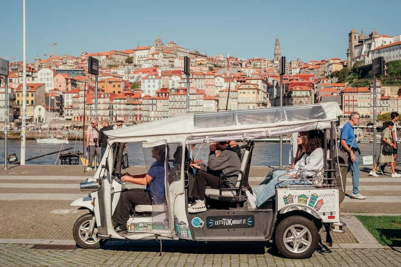 Porto Half Day Tuk Tuk Tour Clérigos, Seaside and Viewpoints - The central Porto loop: Aliados, Batalha Square, and Santa Catarina