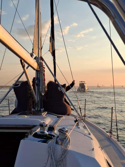 Porto: Sunset Sailboat Tour with Welcome Drink - What to bring for a comfortable deck evening