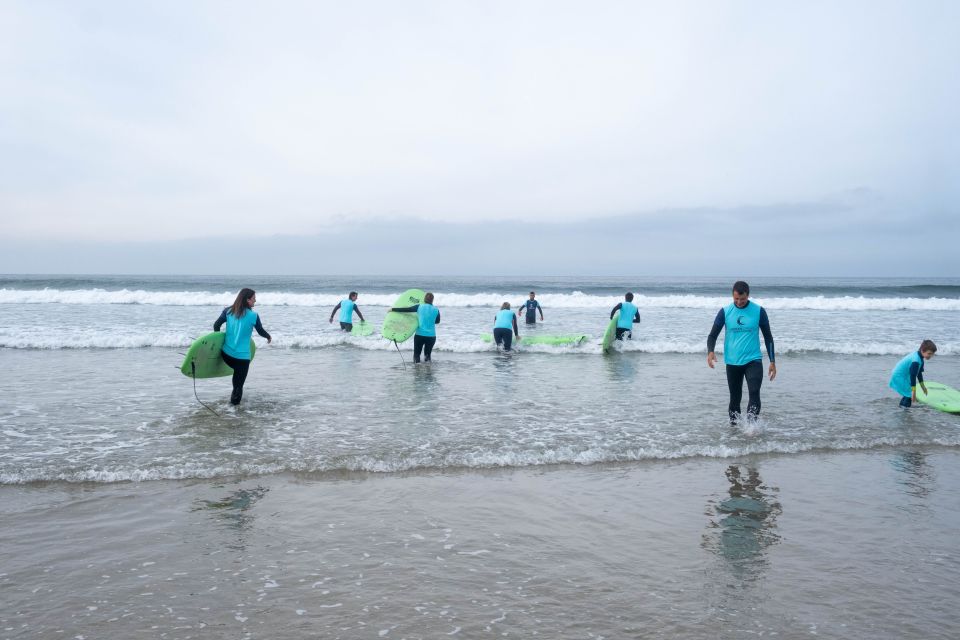 Porto: Surf Lesson with Transportation at Ocean Origin - Small groups: more time with the instructor, less time standing around