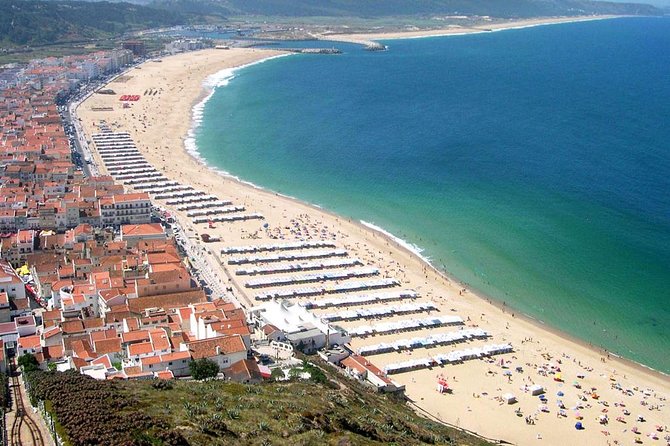 Porto to Lisbon up to 5 stops Aveiro Coimbra Fátima Nazaré Óbidos - Nazaré (Praia da Nazaré): fishermen village energy in a short window