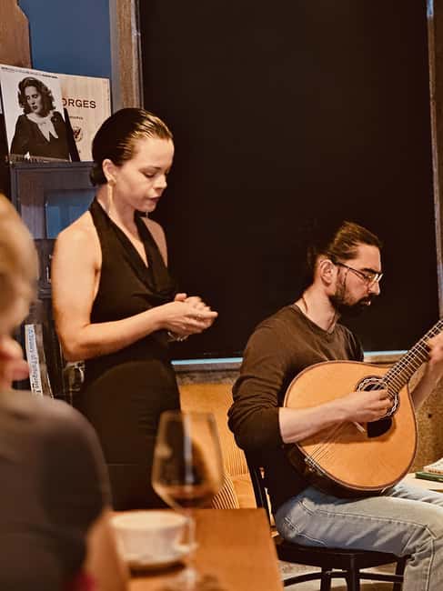 Porto: Traditional Fado Show with Welcome Drink - Portuguese wine during the show: included, but the music stays in charge