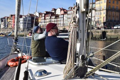 Private Sailing Charter in Porto - West Toward the Ocean: Arrábida Bridge and the Porto Cruise Terminal