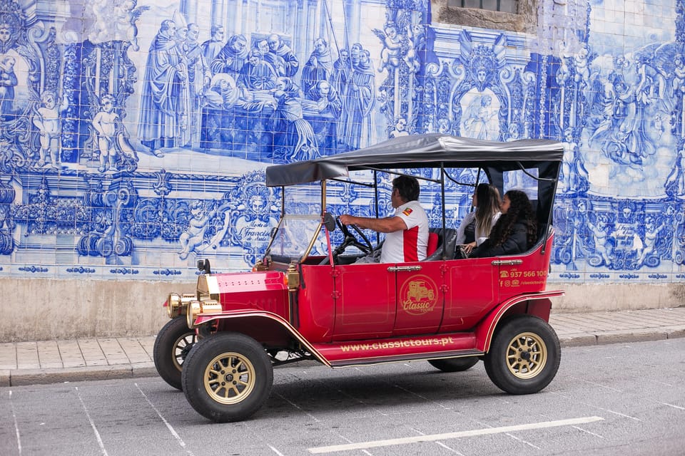 Tour Porto: Classic Adventure in Electric Tuk Tuk - Your guide turns a ride into Porto: Carlos Bonito and Tiago examples